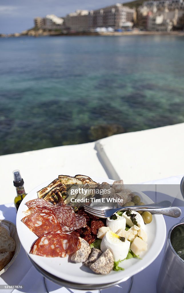 Plate of antipasto with sea views, Kartell restaurant, Marsallforn, Gozo, Malta