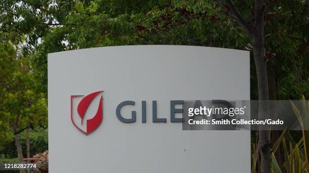 Sign with logo for pharmaceutical company Gilead in the Silicon Valley, Foster City, California, April 11, 2020.