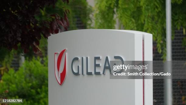 Sign with logo for pharmaceutical company Gilead in the Silicon Valley, Foster City, California, April 11, 2020.