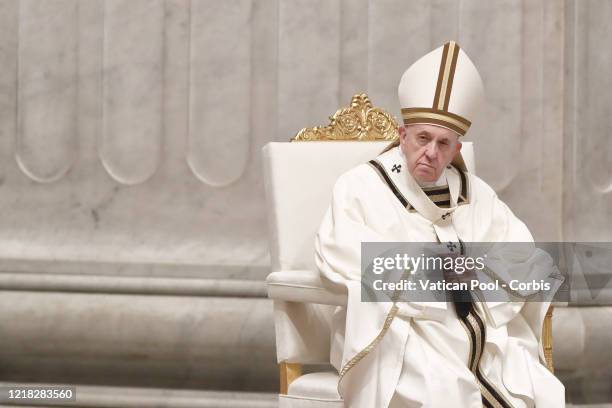 Pope Francis leads the Easter Vigil in the Holy Night of Easter in St. Peter's Basilica on April 11, 2020 in Vatican City, Vatican. Pope Francis...