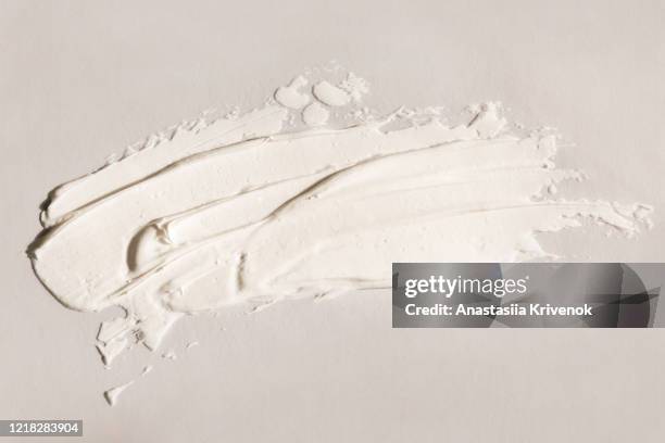 cosmetic cream texture on white background. moisturiser for face and body with natural ingredients. organic and beauty concept. - jojoba stock pictures, royalty-free photos & images
