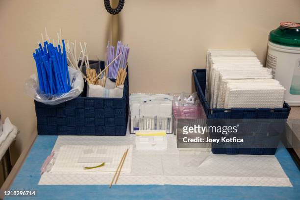 sample collection tools at a gynecologist doctor's office - cervical pap smear stock pictures, royalty-free photos & images