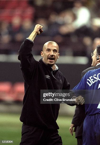 Joy for Chelsea manager Gianluca Vialli after holding AC Milan to a draw in the UEFA Champions League Group H match at the San Siro Stadium in Milan,...