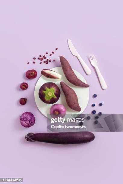 purple colour vegan food still life image. - fibre food stockfoto's en -beelden