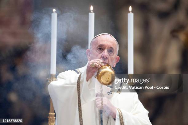 Pope Francis leads the solemn Easter Mass behind closed doors at St. Peter’s Basilica, on April 12, 2020 in Vatican City, Vatican. Following the...