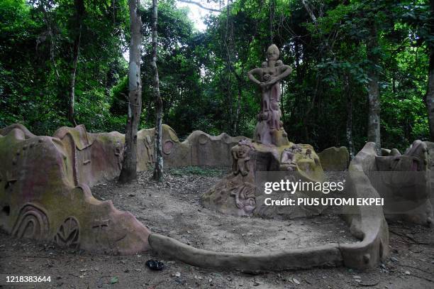 Sculpture of the goddess of fertility at the Oshogbo Sacred Grove, the last sacred forest in Oshogbo, southwest Nigeria, on June 3, 2020. The dense...