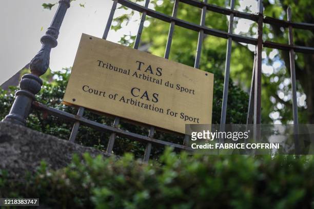 Picture taken on June 8, 2020 shows a sign at the entrance of the Court of Arbitration for Sport in Lausanne on the opening day of an appeal by...
