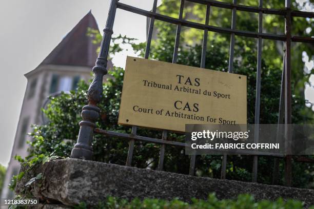 Picture taken on June 8, 2020 shows a sign at the entrance of the Court of Arbitration for Sport in Lausanne on the opening day of an appeal by...