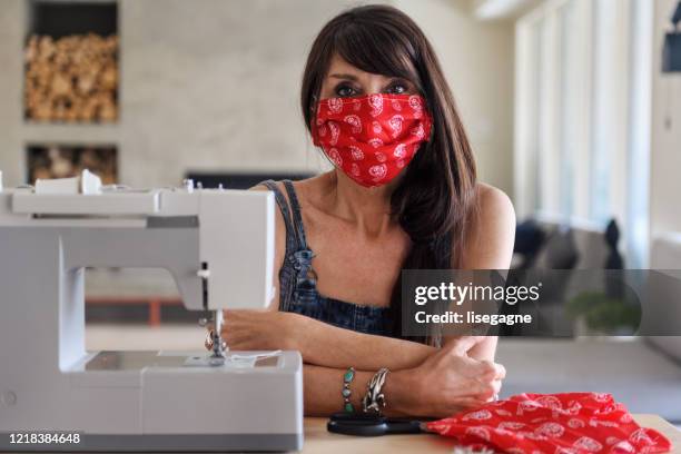homemade protective masks - sewing mask stock pictures, royalty-free photos & images