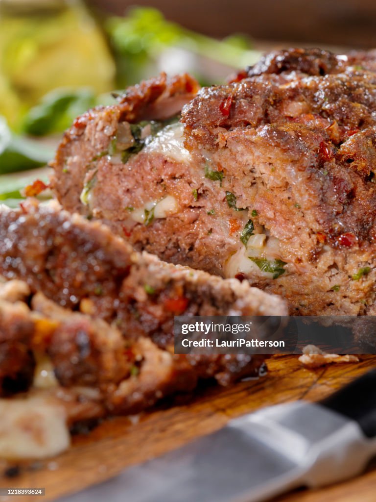 Sicilian Style Rolled Meatloaf with Deli Ham, Basil and Mozzarella