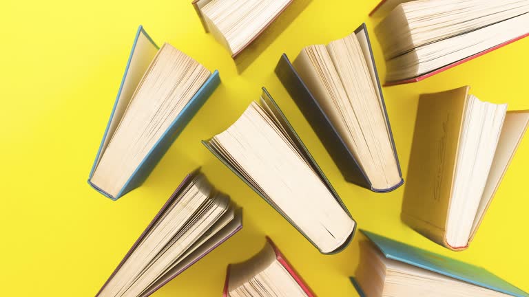 https://media.gettyimages.com/id/1218401444/video/different-books-appear-on-yellow-background-stop-motion.jpg?b=1&s=640x640&k=20&c=7eVi2AMu3KDR8UUUUe6nBjD10s6GdG7PdCQo0NyOimU=