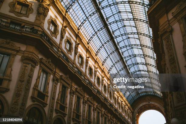 one wing of galleria vittorio emanuele ii - galleria vittorio emanuele ii stock-fotos und bilder