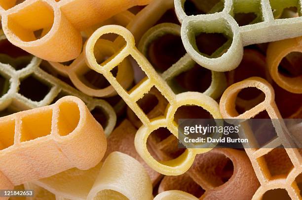 penis shaped italian pasta - pene foto e immagini stock