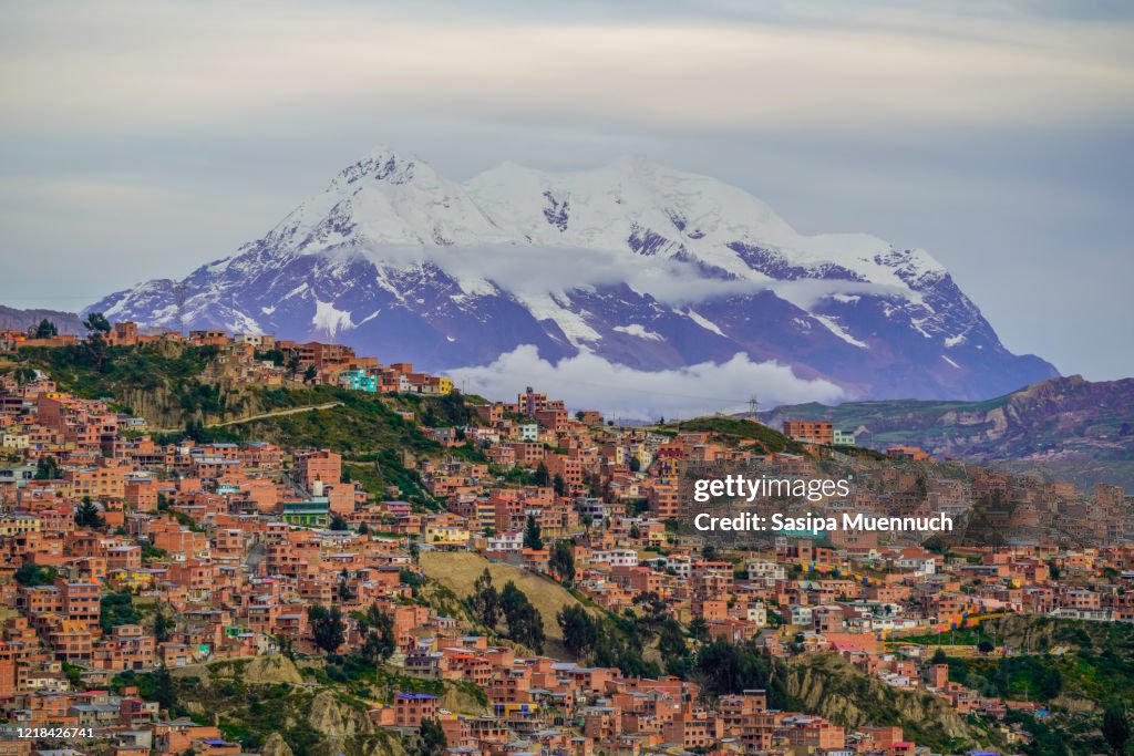 Cityscape of La Paz with Illimani Mountain rising in the background, Bolivia