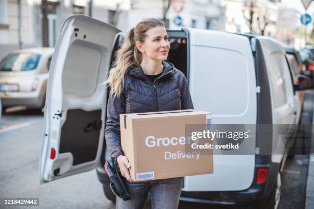 food delivering at home address with car - food van stock pictures, royalty-free photos & images