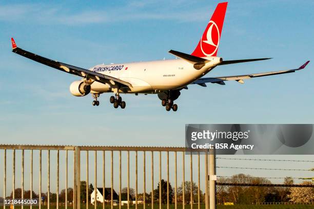 Cargo plane is seen arriving at Maastricht Aachen Airport amid the coronavirus outbreak on April 10, 2020 in Maastricht, Netherlands. Due to the...