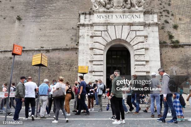 Tourists wait in line to enter the Vatican Museums on June 8, 2020 in Vatican City, Vatican. Before the coronavirus pandemic, the Vatican Museums...