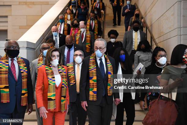 Speaker of the House Nancy Pelosi, D-Calif., and other members of Congress gather at the Emancipation Hall, to observe a moment of silence to honor...