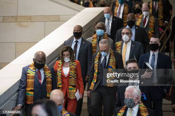 House Speaker Nancy Pelosi, a Democrat from California, and Senate Minority Leader Chuck Schumer, a Democrat from New York, arrive with House and...