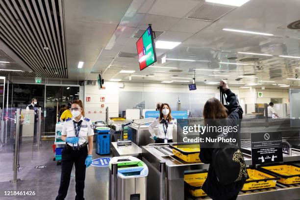 The security check at the international airport of Roma Leonardo Da Vinci. The airport is slowly come back to normality after the European Member...