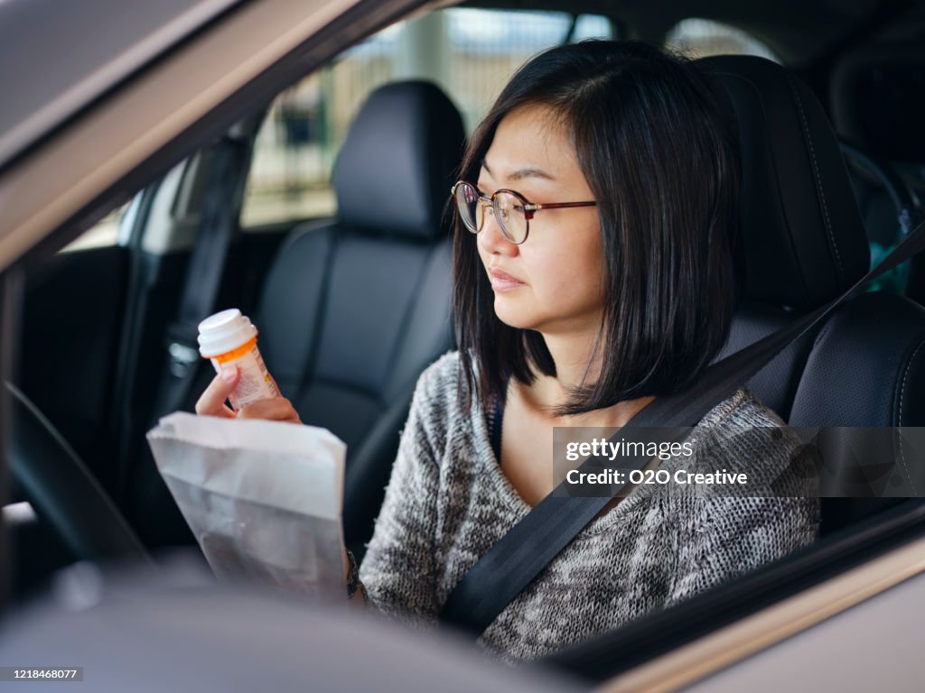 Woman at Drive-Through Pharmacy