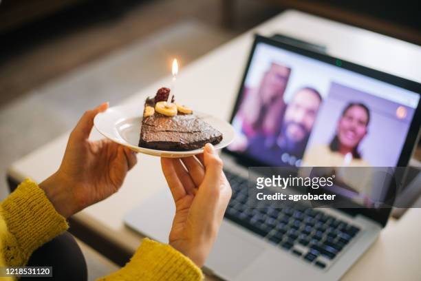 Woman celebrating birthday with video conference