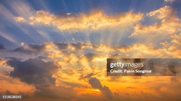 panorama colorful clouds on the dramatic sunset sky. - sunset rays stock pictures, royalty-free photos & images