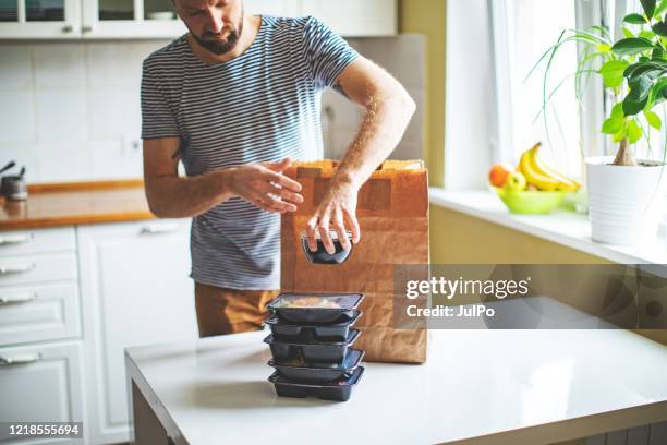 takeaway meals at home during quarantine - food package stock pictures, royalty-free photos & images