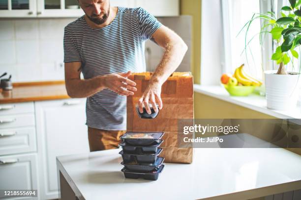 takeaway meals at home during quarantine - meal box stock pictures, royalty-free photos & images