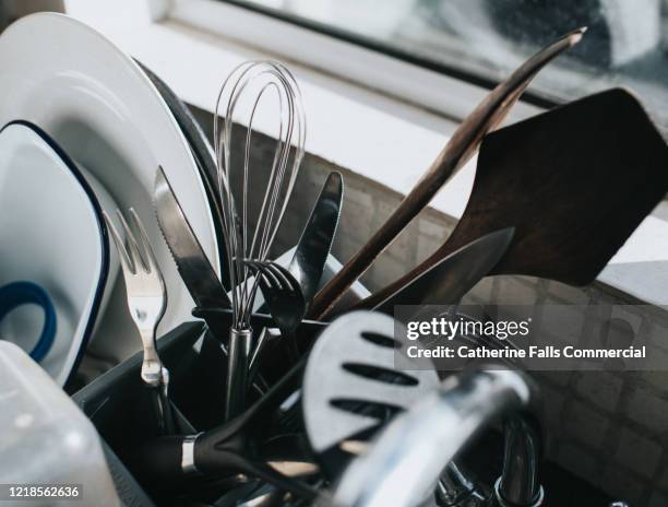 dish drying rack - kitchen cutlery stock pictures, royalty-free photos & images
