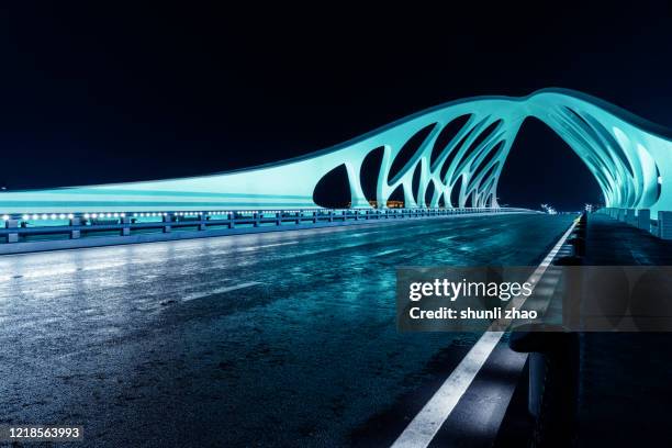 modern bridge structure after rain - rain night ストックフォトと画像