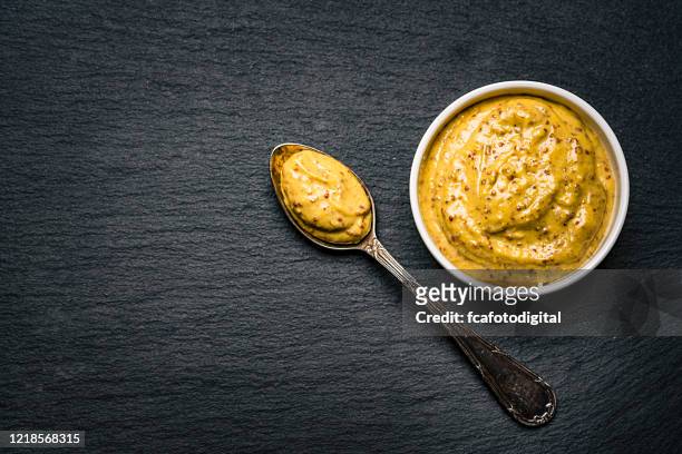 dijon mustard in a bowl - mustard stock pictures, royalty-free photos & images