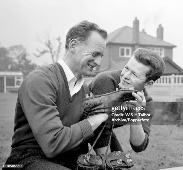 Former Preston North End footballer Tom Finney at home with his son Brian on October 6, 1963 in Preston, England.