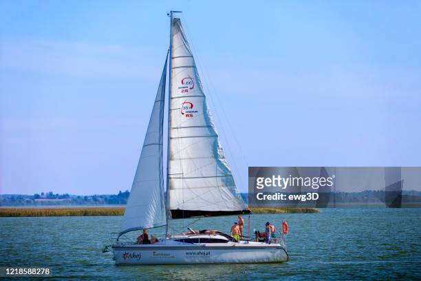 vacations in poland - sailboat in masuria, land of a thousand lakes - sniardwy stock pictures, royalty-free photos & images