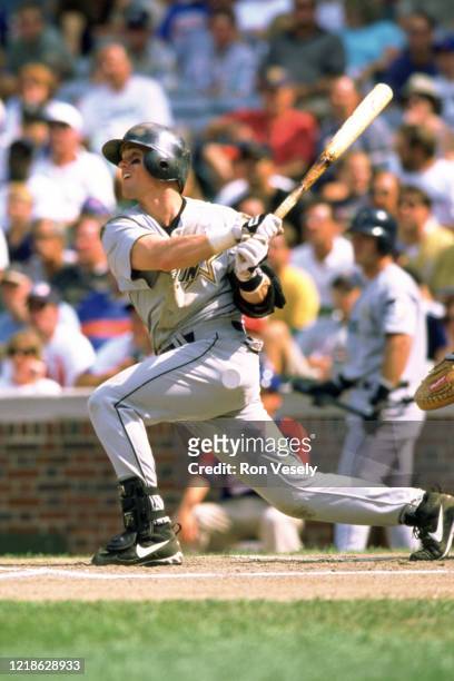 Craig Biggio of the Houston Astros bats during an MLB game at Wrigley Field in Chicago, Illinois. Biggio played for 20 seasons, all with the Houston...