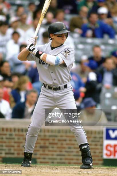 Craig Biggio of the Houston Astros bats during an MLB game at Wrigley Field in Chicago, Illinois. Biggio played for 20 seasons, all with the Houston...