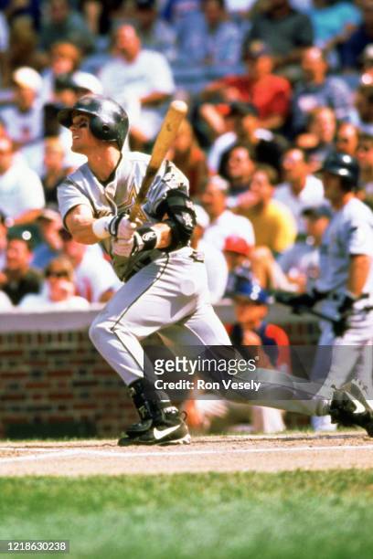 Craig Biggio of the Houston Astros bats during an MLB game at Wrigley Field in Chicago, Illinois. Biggio played for 20 seasons, all with the Houston...