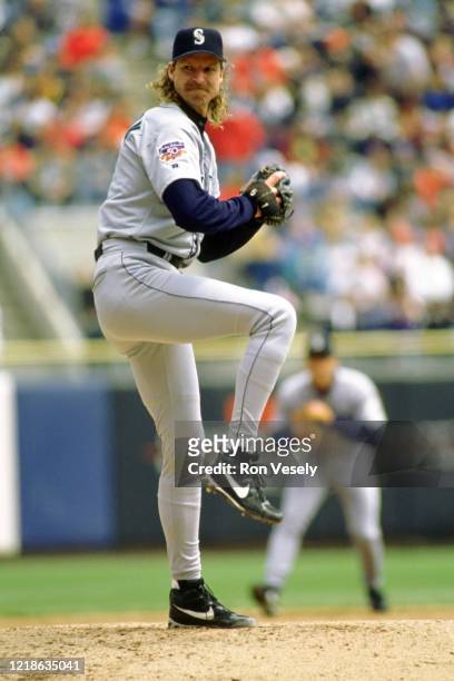 Randy Johnson of the Seattle Mariners pitches during an MLB game at County Stadium in Milwaukee, Wisconsin. Johnson played for 22 season with 6...