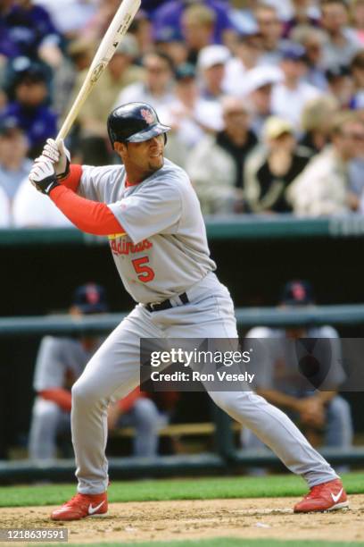 Albert Pujols of the St. Louis Cardinals bats during an MLB game at Coors Field in Denver, Colorado. Pujols has played for 19 seasons with 2...