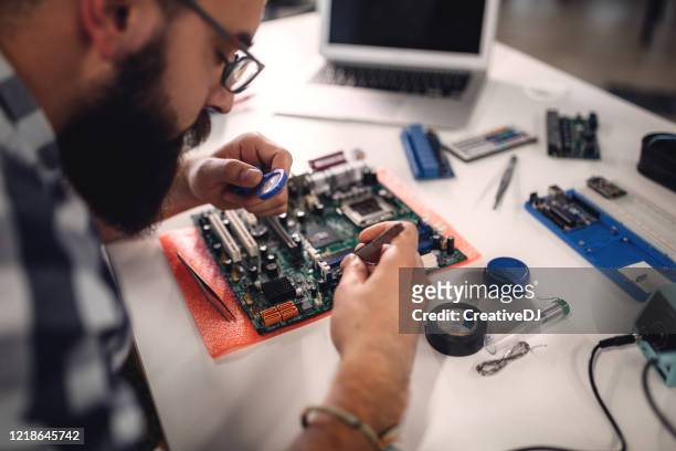 computer scientist working in laboratory - computer scientist stock pictures, royalty-free photos & images