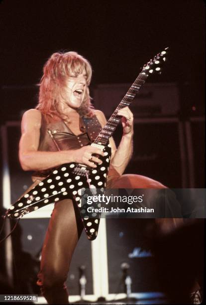 Guitarist Randy Rhoads is shown performing on stage during a live concert appearance with the Blizzard of Ozz on August 26, 1981.