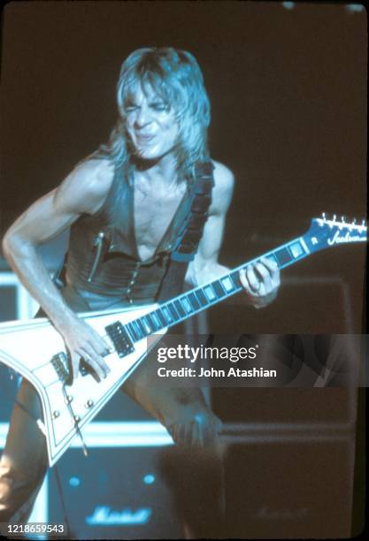 Guitarist Randy Rhoads is shown performing on stage during a live concert appearance with the Blizzard of Ozz on August 26, 1981.