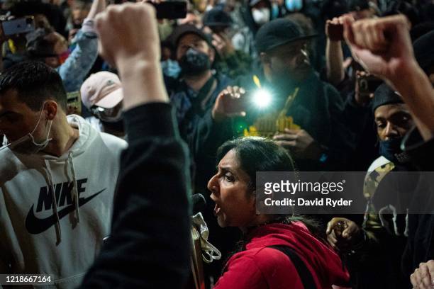 Seattle City Council member Kshama Sawant, a critic of Mayor Jenny Durkan and the Seattle Police Department, speaks as demonstrators hold a rally...