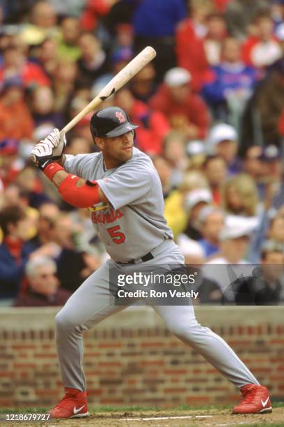 Albert Pujols of the St. Louis Cardinals bats during an MLB game at Wrigley Field in Chicago, Illinois. Pujols has played for 19 seasons with 2...