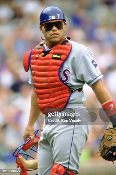 Ivan Rodriguez of the Texas Rangers looks on during an MLB game at Comiskey Park in Chicago, Illinois. Rodriguez played for 21 seasons with 6...