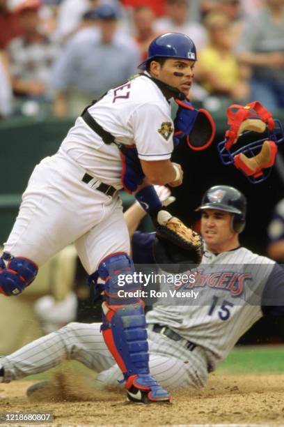Ivan Rodriguez of the Texas Rangers fields during an MLB game at The Ballpark in Arlington in Arlington, Texas. Rodriguez played for 21 seasons with...
