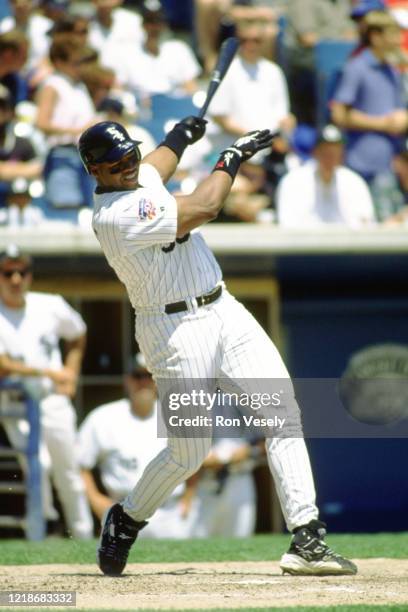 Frank Thomas of the Chicago White Sox bats during an MLB game at Comiskey Park in Chicago, Illinois. Thomas played for 19 seasons with 3 different...