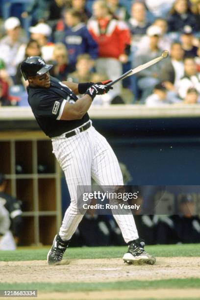 Frank Thomas of the Chicago White Sox bats during an MLB game at Comiskey Park in Chicago, Illinois. Thomas played for 19 seasons with 3 different...