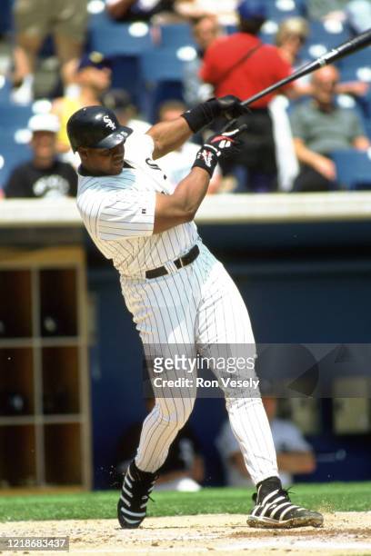 Frank Thomas of the Chicago White Sox bats during an MLB game at Comiskey Park in Chicago, Illinois. Thomas played for 19 seasons with 3 different...