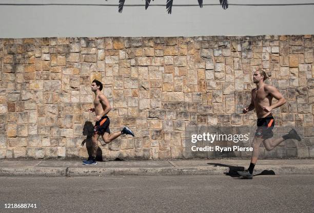 Giants AFL players Tim Taranto & Harry Himmelberg train near their home in Sydney on April 14, 2020 in Sydney, Australia. AFL players across the...